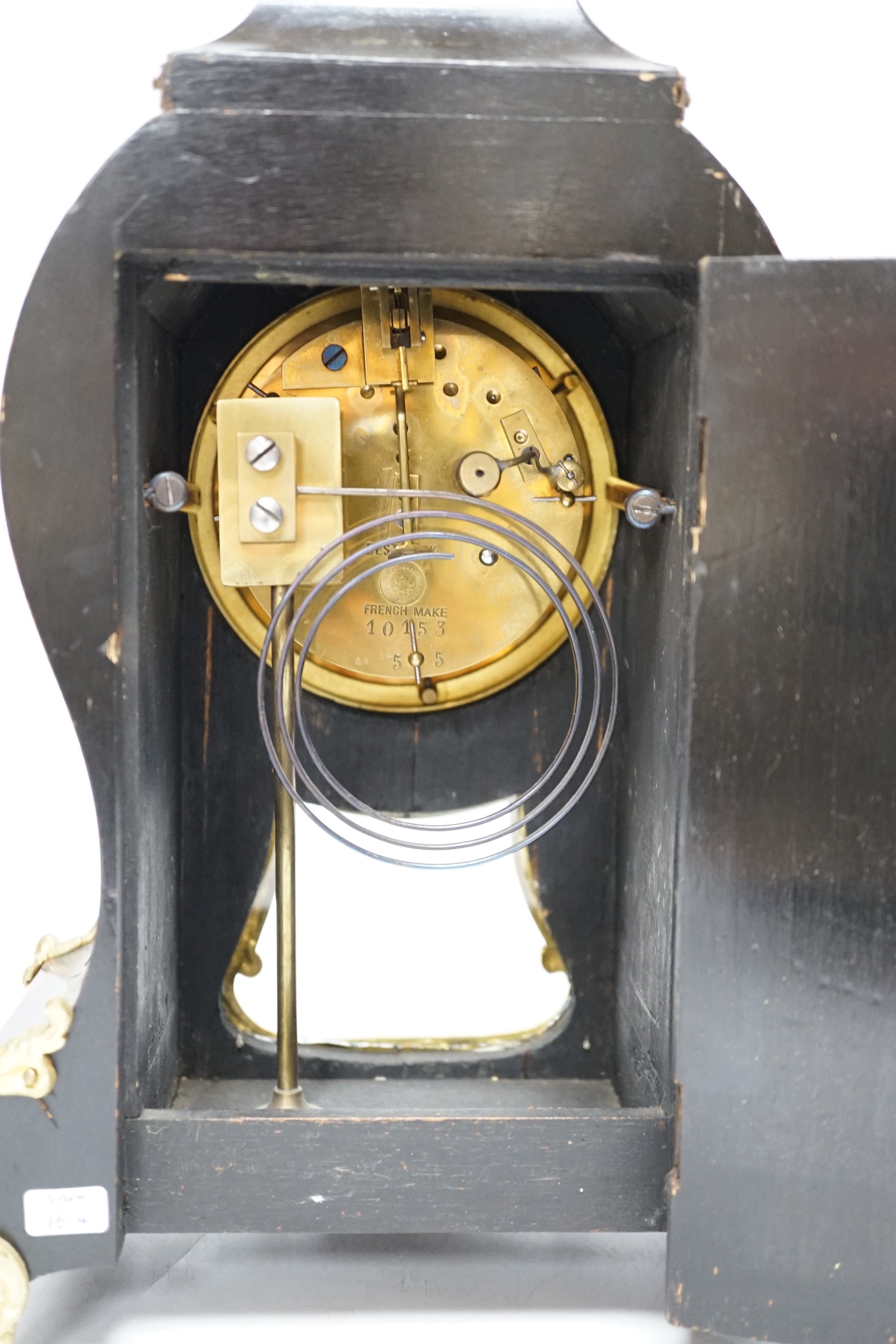 A French red boulle mantel clock, with French movement, striking on a coiled gong, height, 36cm